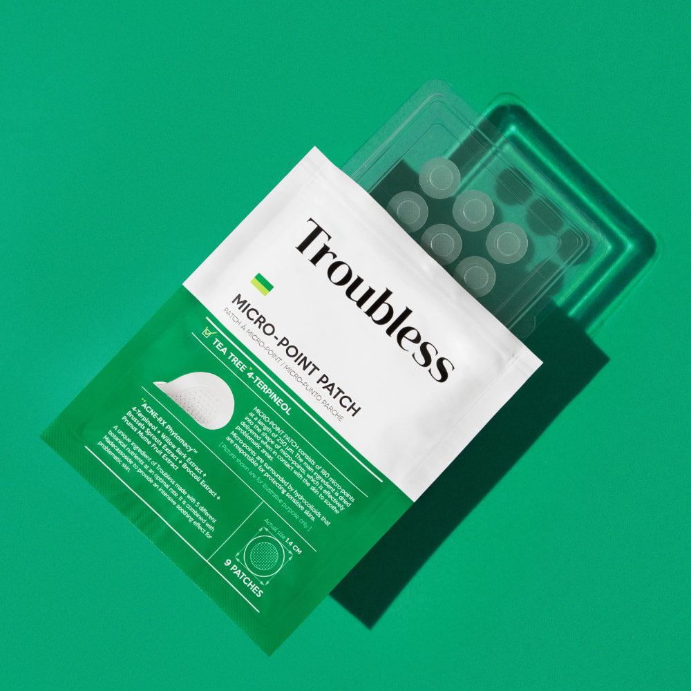 Troubless Micro-Point Patch – weiße und grüne Verpackung mit Folie der Patches auf grünem Hintergrund