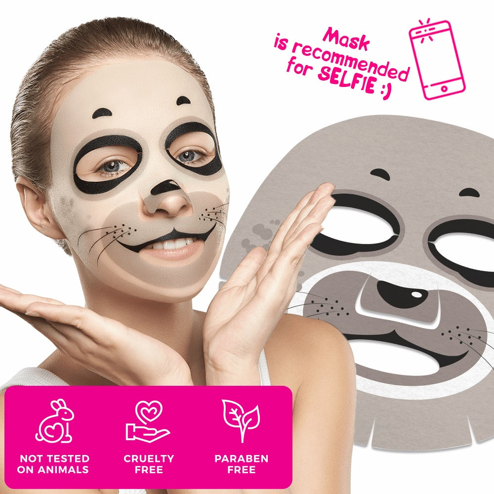 Frau mit aufgesetzter Tier-Gesichtsmaske im Seehund-Design, daneben Abbildung der Maske; ergänzt durch Icons zu „Not tested on animals“, „Cruelty free“ und „Paraben free“ sowie Hinweis „Mask is recommended for selfie :)“